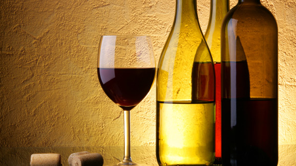 Wineglass and Wine Bottles